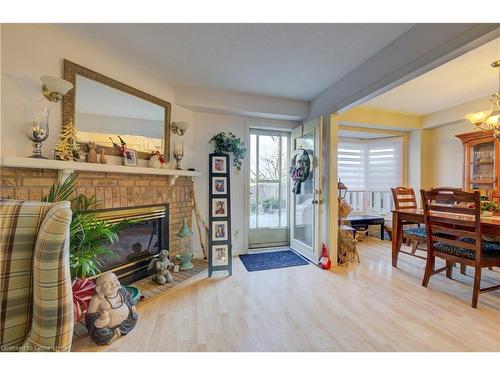 180 Dicenzo Drive, Hamilton, ON - Indoor Photo Showing Other Room With Fireplace