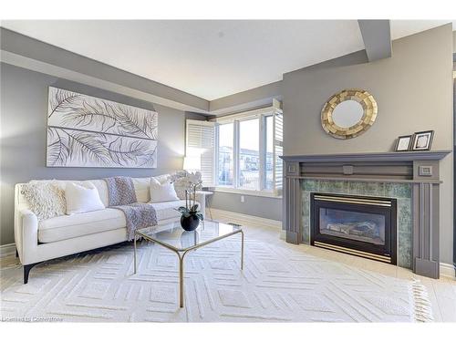 487 Dewitt Road, Stoney Creek, ON - Indoor Photo Showing Living Room With Fireplace