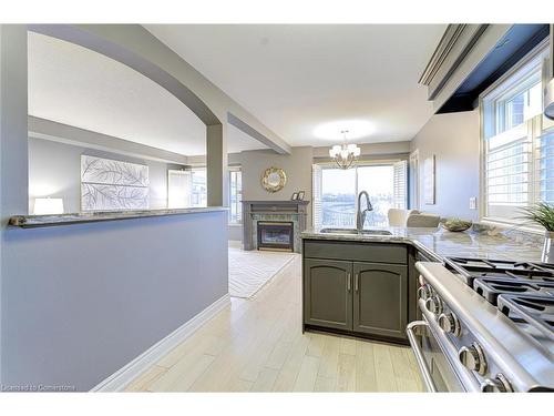 487 Dewitt Road, Stoney Creek, ON - Indoor Photo Showing Kitchen With Fireplace