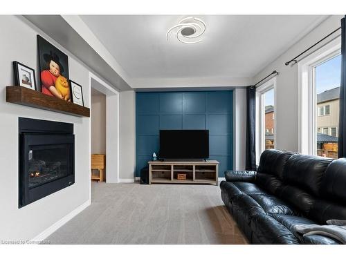 119 Brigham Avenue, Binbrook, ON - Indoor Photo Showing Living Room With Fireplace