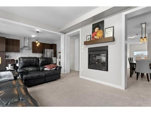 119 Brigham Avenue, Binbrook, ON - Indoor Photo Showing Living Room With Fireplace