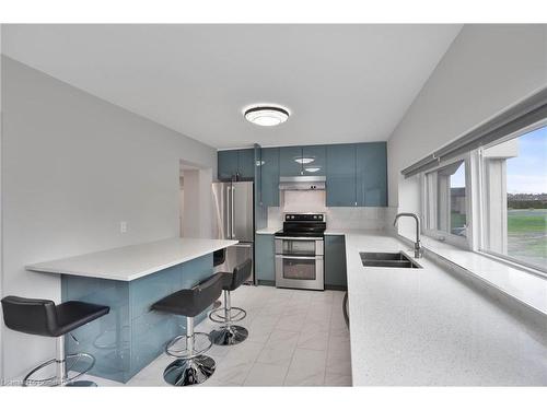 827 Ridge Road, Stoney Creek, ON - Indoor Photo Showing Kitchen With Double Sink