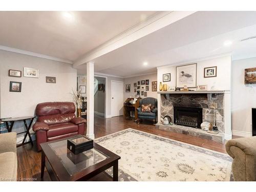 41-2301 Cavendish Drive, Burlington, ON - Indoor Photo Showing Living Room With Fireplace