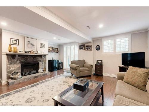 41-2301 Cavendish Drive, Burlington, ON - Indoor Photo Showing Living Room With Fireplace