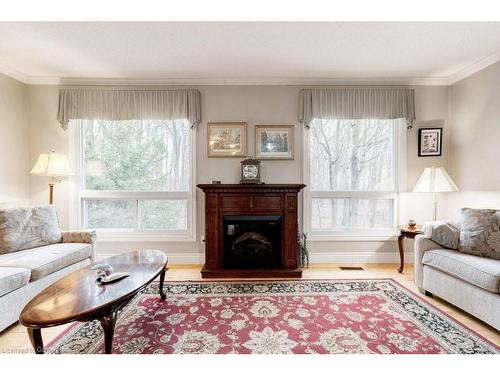 41-2301 Cavendish Drive, Burlington, ON - Indoor Photo Showing Living Room With Fireplace