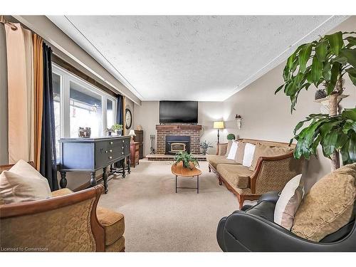 3173 Young Road, Caledonia, ON - Indoor Photo Showing Living Room With Fireplace