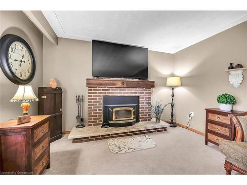 3173 Young Road, Caledonia, ON - Indoor Photo Showing Living Room With Fireplace