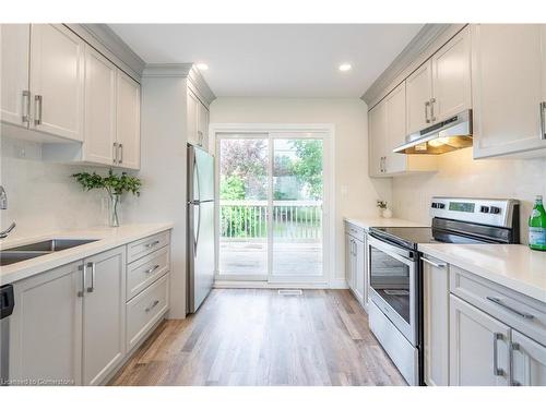 1-86 Brentwood Drive, Hamilton, ON - Indoor Photo Showing Kitchen With Stainless Steel Kitchen With Double Sink With Upgraded Kitchen