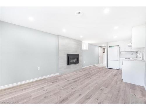 150 Bonaventure Drive, Hamilton, ON - Indoor Photo Showing Other Room With Fireplace