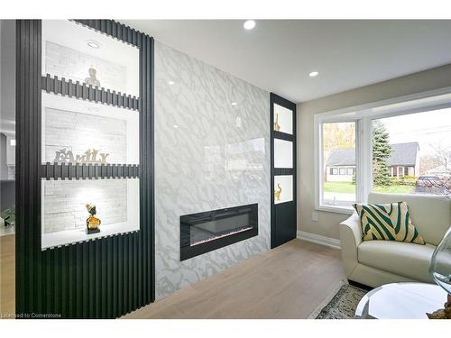 75 Randall Avenue, Hamilton, ON - Indoor Photo Showing Living Room With Fireplace