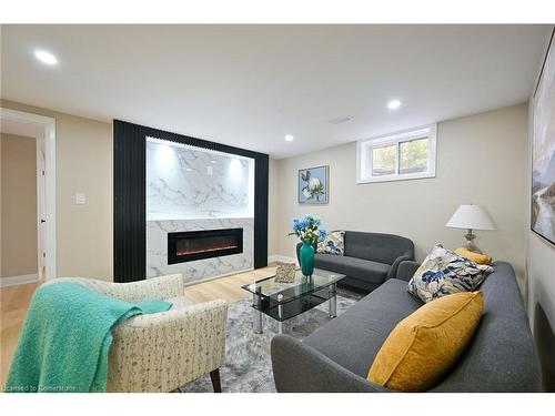 75 Randall Avenue, Hamilton, ON - Indoor Photo Showing Living Room With Fireplace