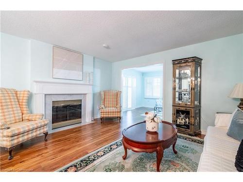 345 Silverbirch Boulevard, Mount Hope, ON - Indoor Photo Showing Living Room With Fireplace