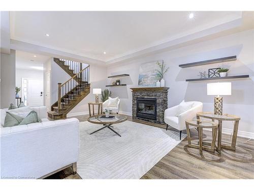 23 Blackburn Lane, Hamilton, ON - Indoor Photo Showing Living Room With Fireplace