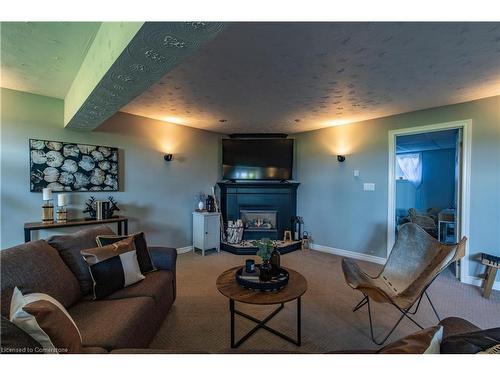 11635 Burnaby Road, Wainfleet, ON - Indoor Photo Showing Living Room With Fireplace