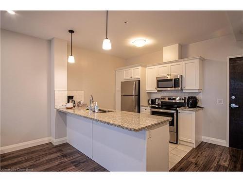 919-118 King Street E, Hamilton, ON - Indoor Photo Showing Kitchen With Double Sink