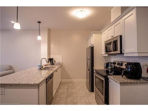 919-118 King Street E, Hamilton, ON - Indoor Photo Showing Kitchen With Upgraded Kitchen