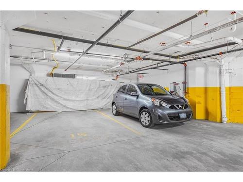 212-80 King William Street, Hamilton, ON - Indoor Photo Showing Garage