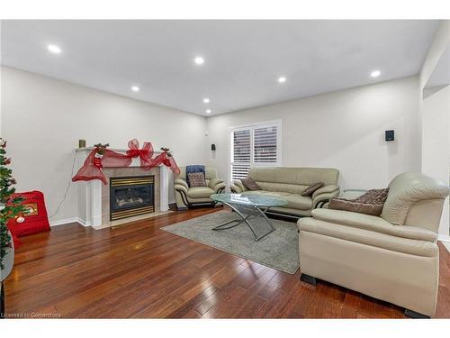 393 Old Mud Street, Stoney Creek, ON - Indoor Photo Showing Living Room With Fireplace