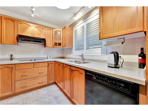 18-1030 Colborne Street E, Brantford, ON - Indoor Photo Showing Kitchen With Double Sink