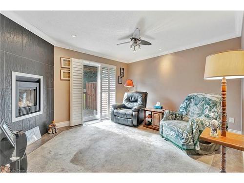 18-1030 Colborne Street E, Brantford, ON - Indoor Photo Showing Living Room With Fireplace