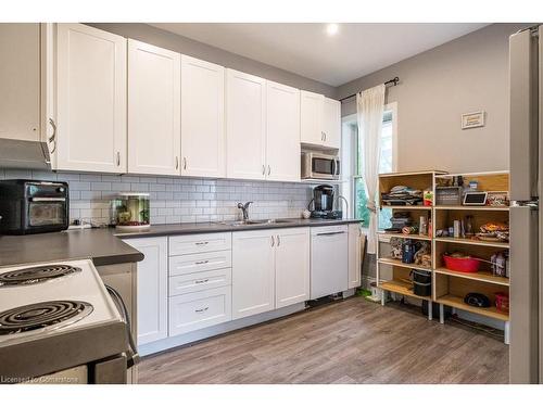 1125 Cannon Street E, Hamilton, ON - Indoor Photo Showing Kitchen With Double Sink