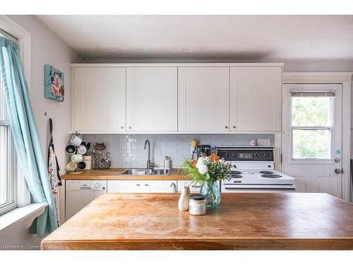 1125 Cannon Street E, Hamilton, ON - Indoor Photo Showing Kitchen With Double Sink