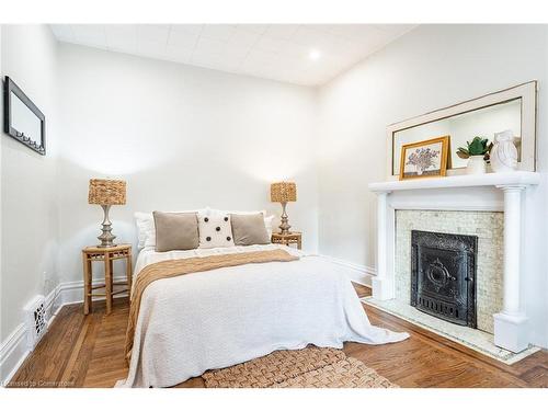 142 Bold Street, Hamilton, ON - Indoor Photo Showing Bedroom With Fireplace