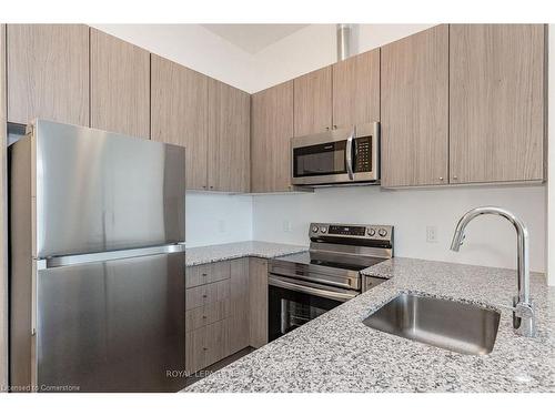 512-460 Gordon Krantz Avenue, Milton, ON - Indoor Photo Showing Kitchen With Stainless Steel Kitchen