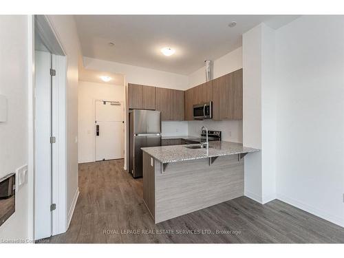 512-460 Gordon Krantz Avenue, Milton, ON - Indoor Photo Showing Kitchen With Stainless Steel Kitchen With Double Sink