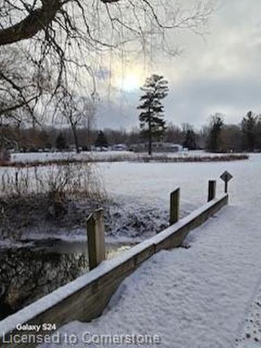 12 Pondview-2490 Governors Road, Ancaster, ON - Outdoor With Body Of Water With View