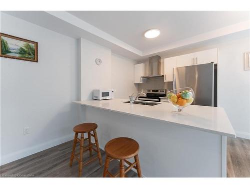 322-1 Redfern Avenue, Hamilton, ON - Indoor Photo Showing Kitchen With Stainless Steel Kitchen