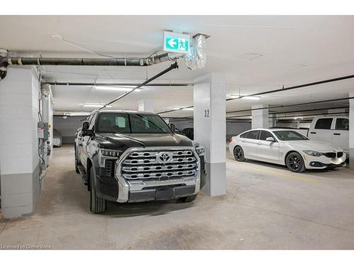 B602-3200 Dakota Common, Burlington, ON - Indoor Photo Showing Garage