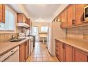 1476 Barton Street E, Hamilton, ON  - Indoor Photo Showing Kitchen With Double Sink 