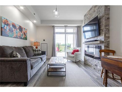 127-5317 Upper Middle Road, Burlington, ON - Indoor Photo Showing Living Room With Fireplace