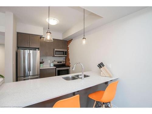 57-377 Glancaster Road, Ancaster, ON - Indoor Photo Showing Kitchen With Stainless Steel Kitchen With Double Sink