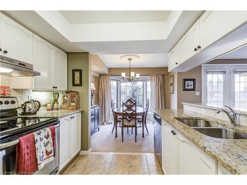 A402-216 Plains Road W, Burlington, ON - Indoor Photo Showing Kitchen With Double Sink