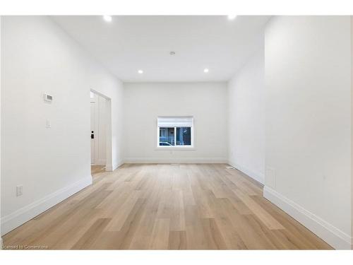 15 Arthur Street N, Hamilton, ON - Indoor Photo Showing Other Room With Fireplace