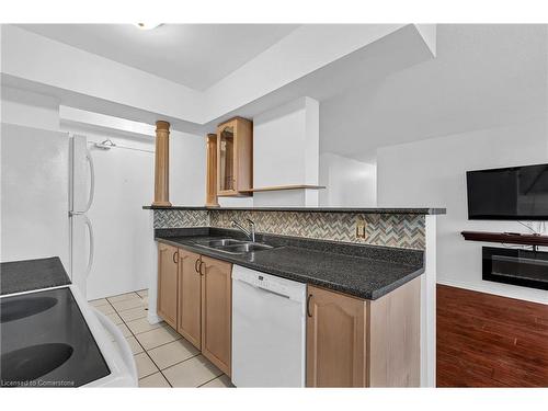 607-851 Queenston Road, Stoney Creek, ON - Indoor Photo Showing Kitchen With Double Sink