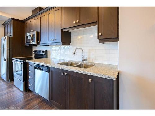 1017-118 King Street E, Hamilton, ON - Indoor Photo Showing Kitchen With Double Sink With Upgraded Kitchen