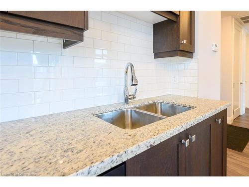 1017-118 King Street E, Hamilton, ON - Indoor Photo Showing Kitchen With Double Sink With Upgraded Kitchen