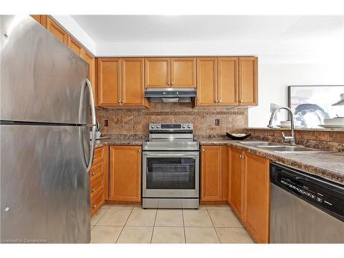 12-151 Green Road, Stoney Creek, ON - Indoor Photo Showing Kitchen With Double Sink