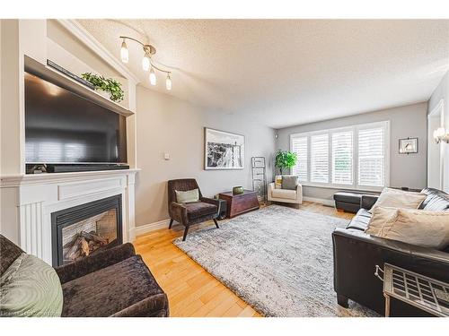 145 Dragoon Drive, Hamilton, ON - Indoor Photo Showing Living Room With Fireplace