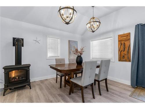 10584 Woodland Drive, Wainfleet, ON - Indoor Photo Showing Dining Room With Fireplace