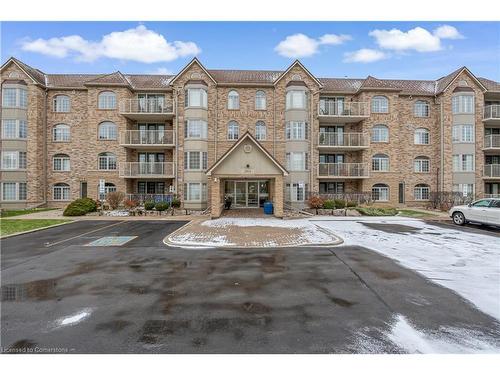 A204-216 Plains Road W, Burlington, ON - Outdoor With Balcony With Facade