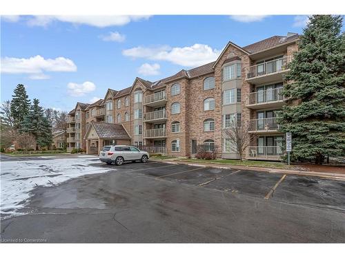 A204-216 Plains Road W, Burlington, ON - Outdoor With Balcony With Facade