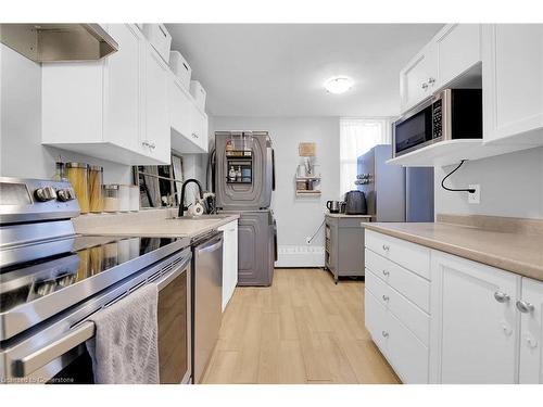 215-350 Quigley Road, Hamilton, ON - Indoor Photo Showing Kitchen With Stainless Steel Kitchen