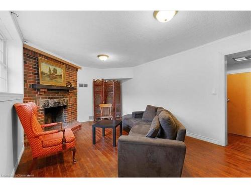 114 Traymore Avenue, Hamilton, ON - Indoor Photo Showing Living Room With Fireplace