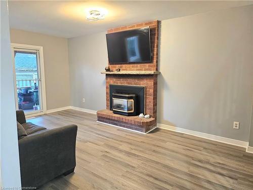 486 Dicenzo Drive, Hamilton, ON - Indoor Photo Showing Living Room With Fireplace