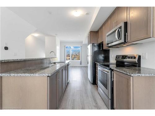 12-590 North Service Road, Stoney Creek, ON - Indoor Photo Showing Kitchen With Upgraded Kitchen