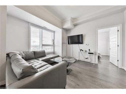 609-1105 Leger Way Way, Milton, ON - Indoor Photo Showing Living Room